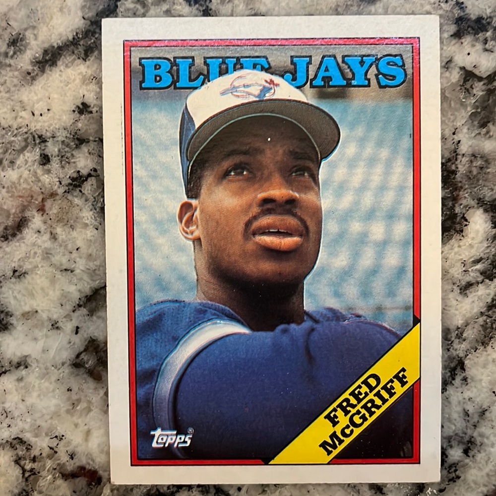 1988 Topps Fred McGriff with ERROR. Printing error left white dot on forehead.